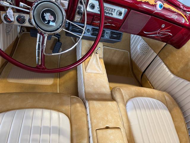 Buick Eight cockpit with custom console, steering wheel, and dashboard.
