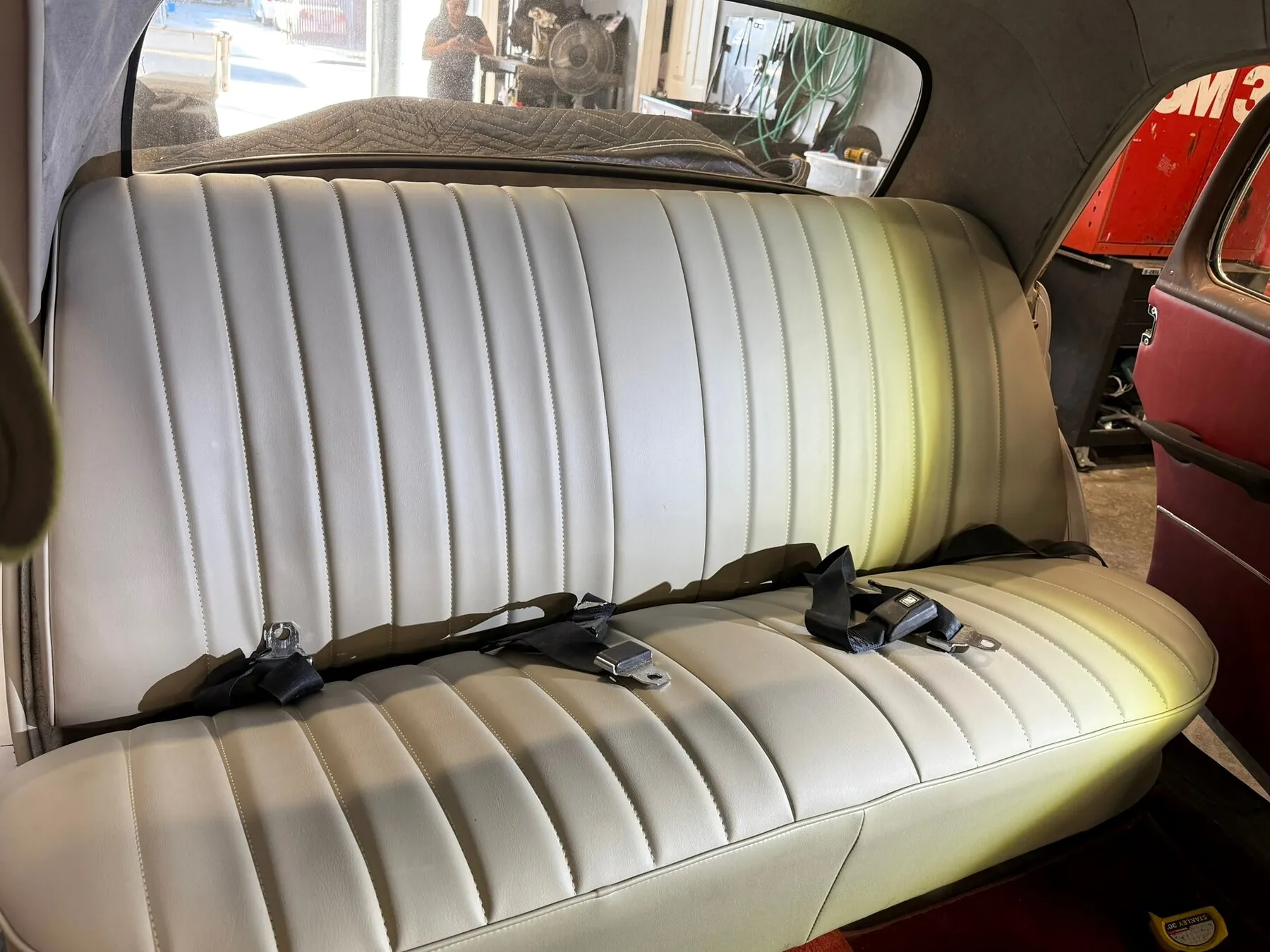 Classic rear bench seat with updated upholstery installed.