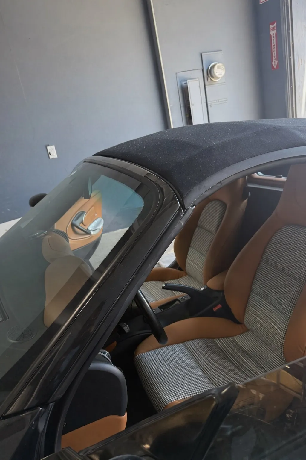 Porsche Boxster S cabin overview with reupholstered seats installed.