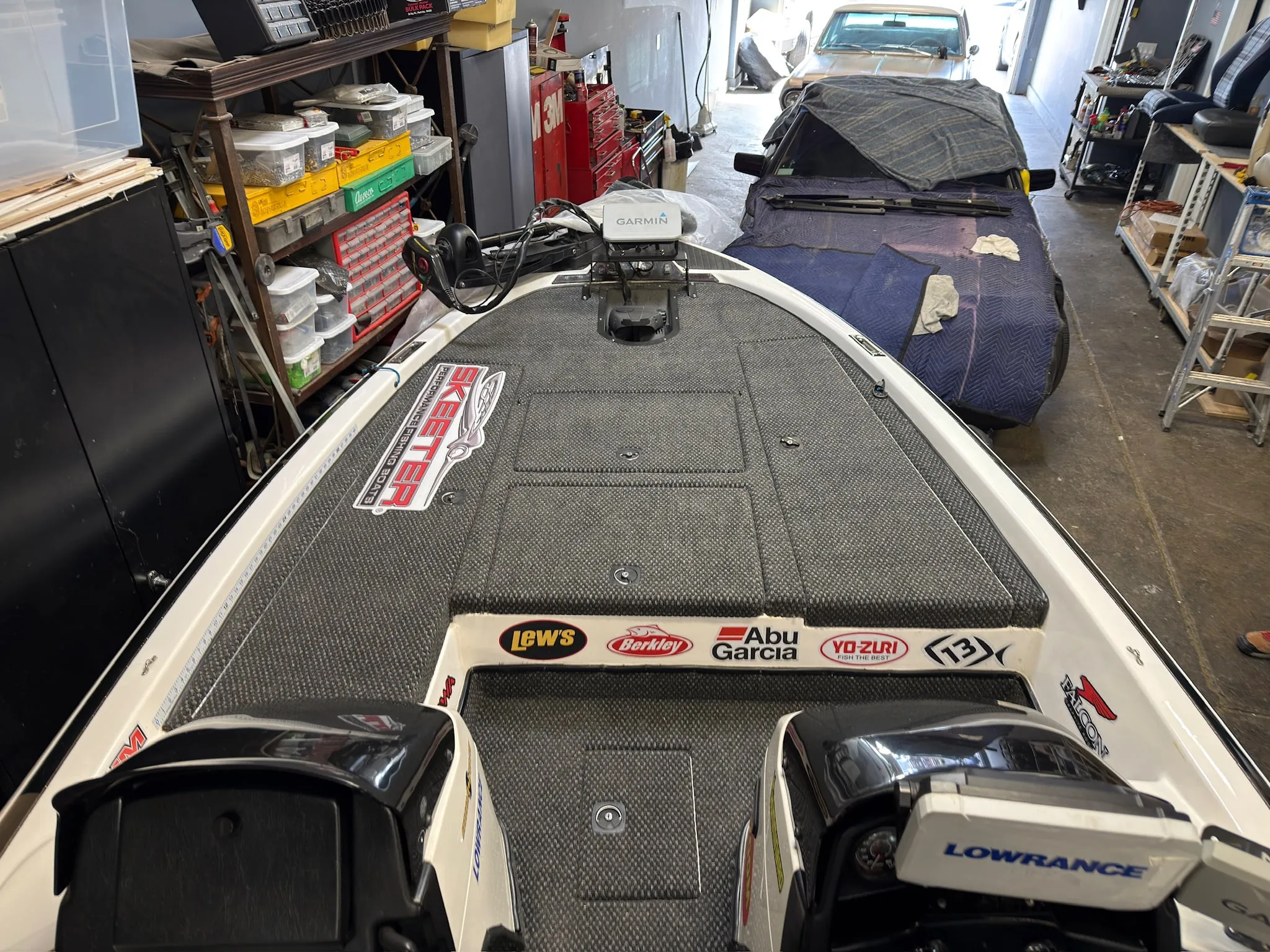 Front deck marine carpet fitted around hatch panels.